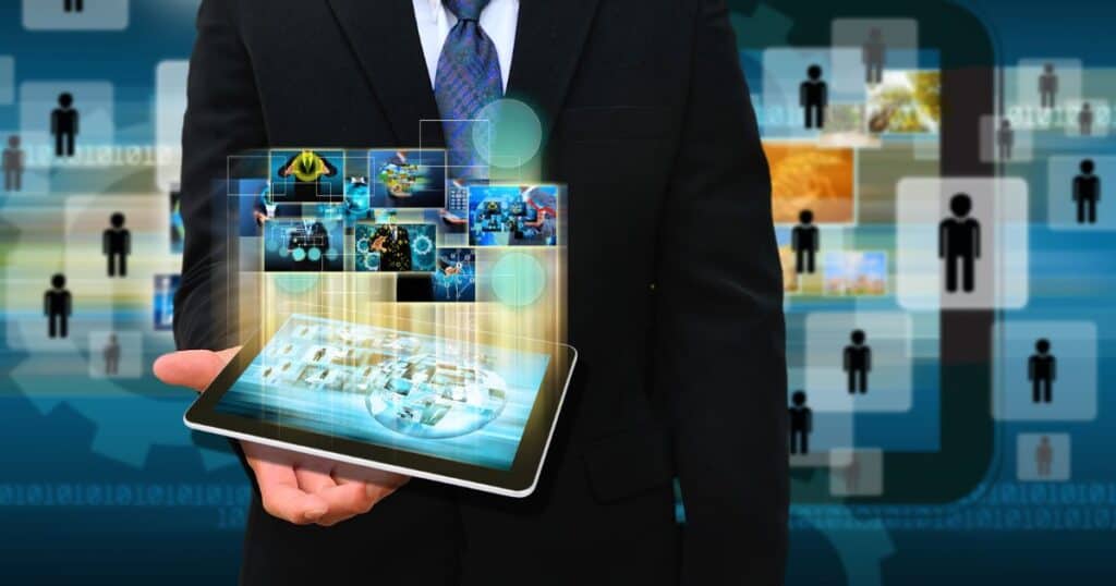 Businessman showcasing executive search industry-specific hiring trends with digital tablet visuals