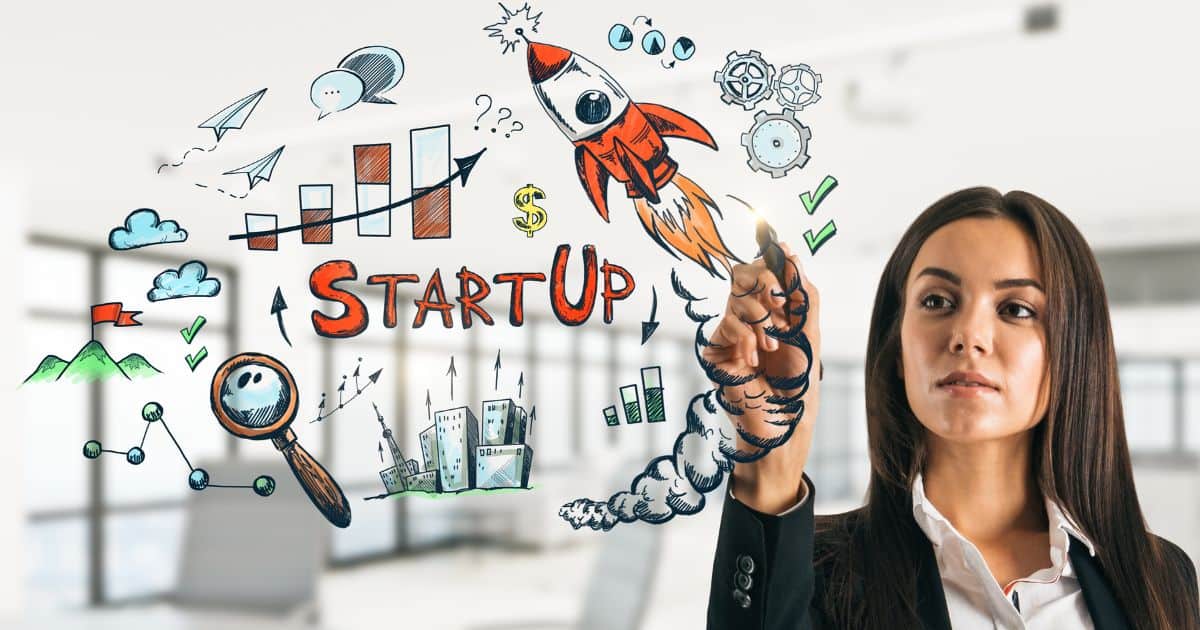 A female leader drawing a startup growth chart with a rocket, showing why leadership matters for startups and scale-ups.