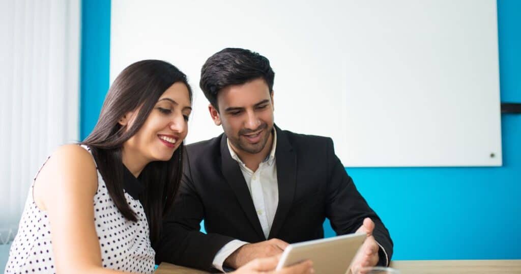 Professional consultants at a recruitment services agency conducting candidate interviews.