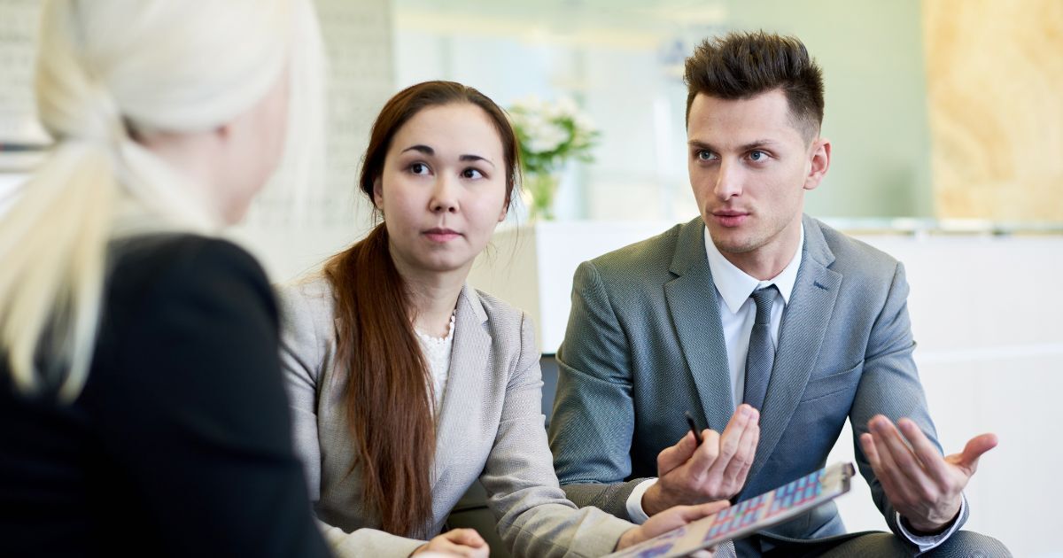Professional team discussing hiring challenges and how recruitment agencies fix common business mistakes