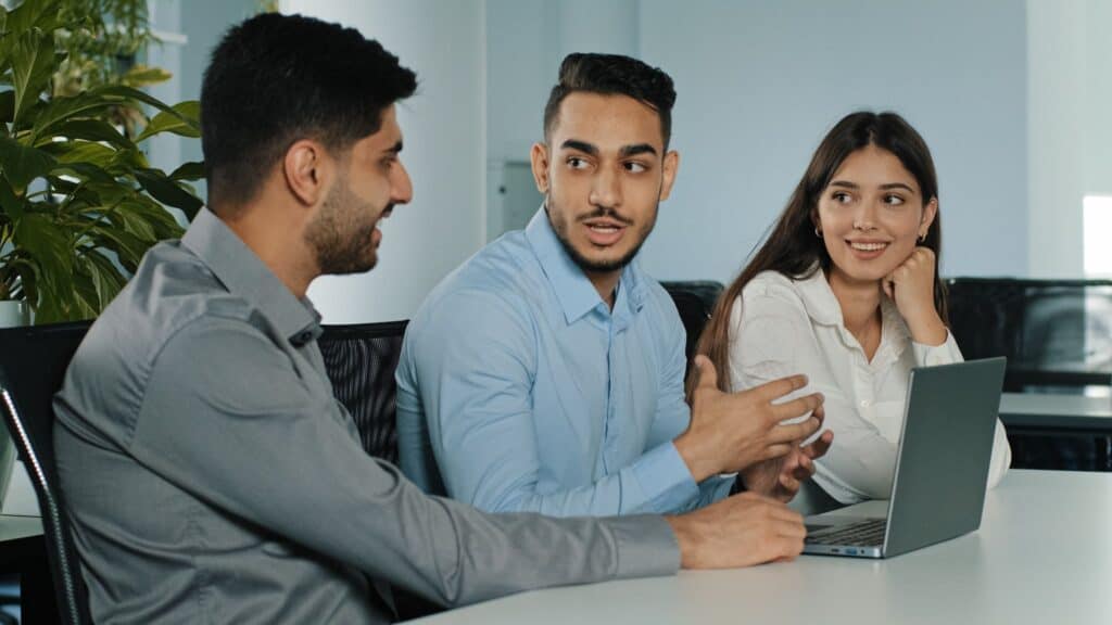 Professional team discussing hiring challenges and how recruitment agencies fix common business mistakes