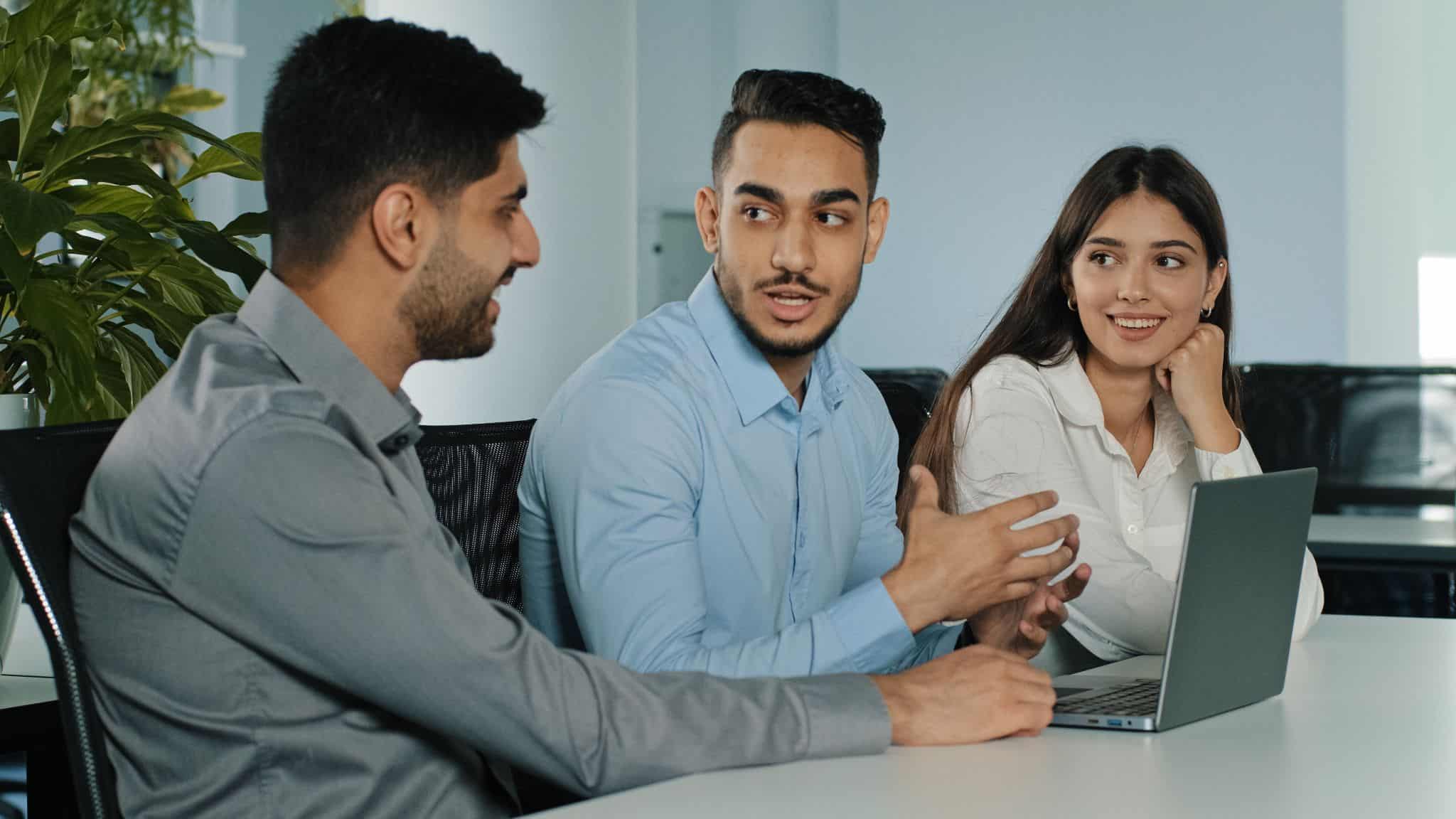 Professional team discussing hiring challenges and how recruitment agencies fix common business mistakes