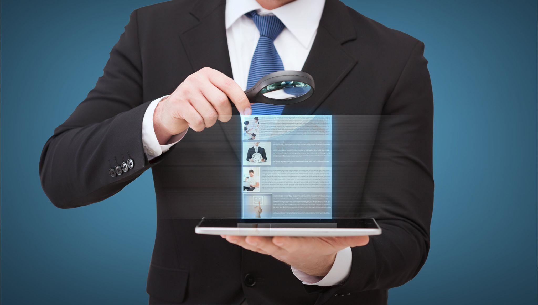 Businessman using magnifying glass to review digital job details for signs of a recruitment scam.